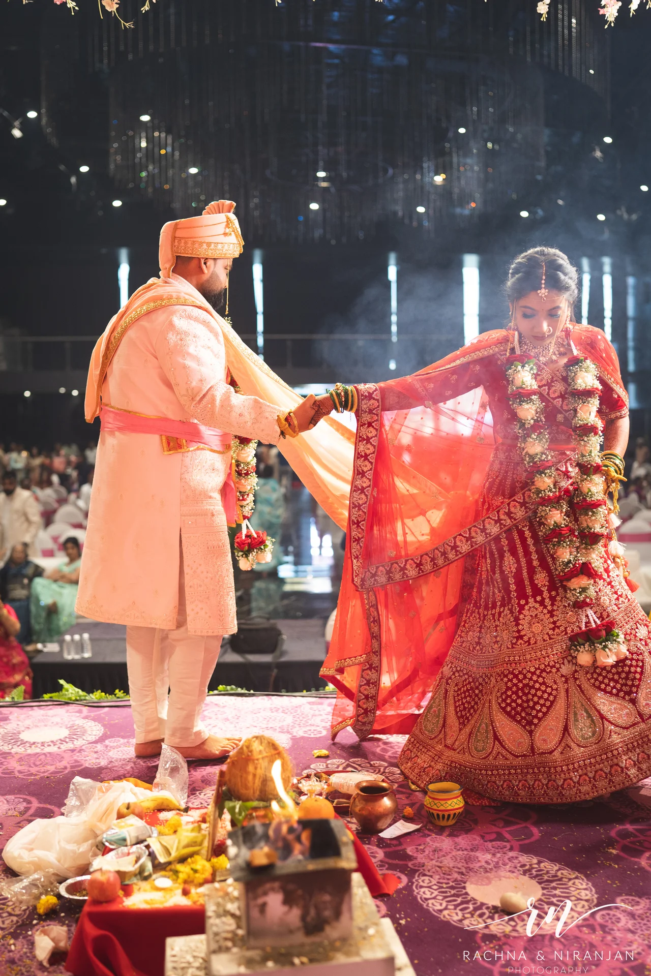 Sneha & Rahul performing sacred pheras during their Gujarati wedding ceremony at Mayfield Estate – timeless wedding ritual photography