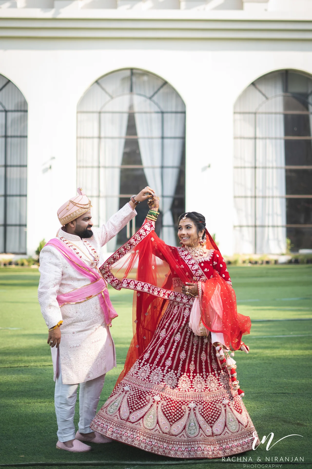 Sneha & Rahul sharing a quiet moment during their couple shoot – elegant candid photography at Mayfield Estate, Pune.