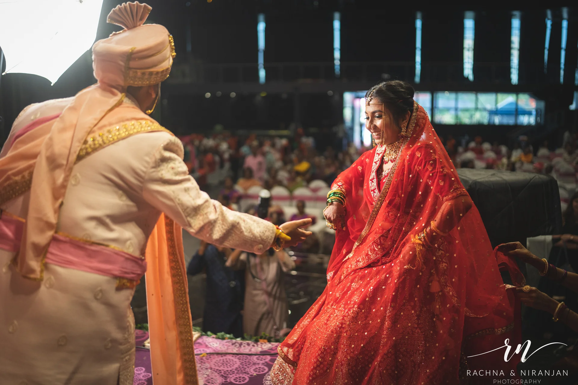 Tearful smiles and happy hearts – candid bridal entry of Sneha at her Gujarati wedding in Pune, captured with emotion and elegance
