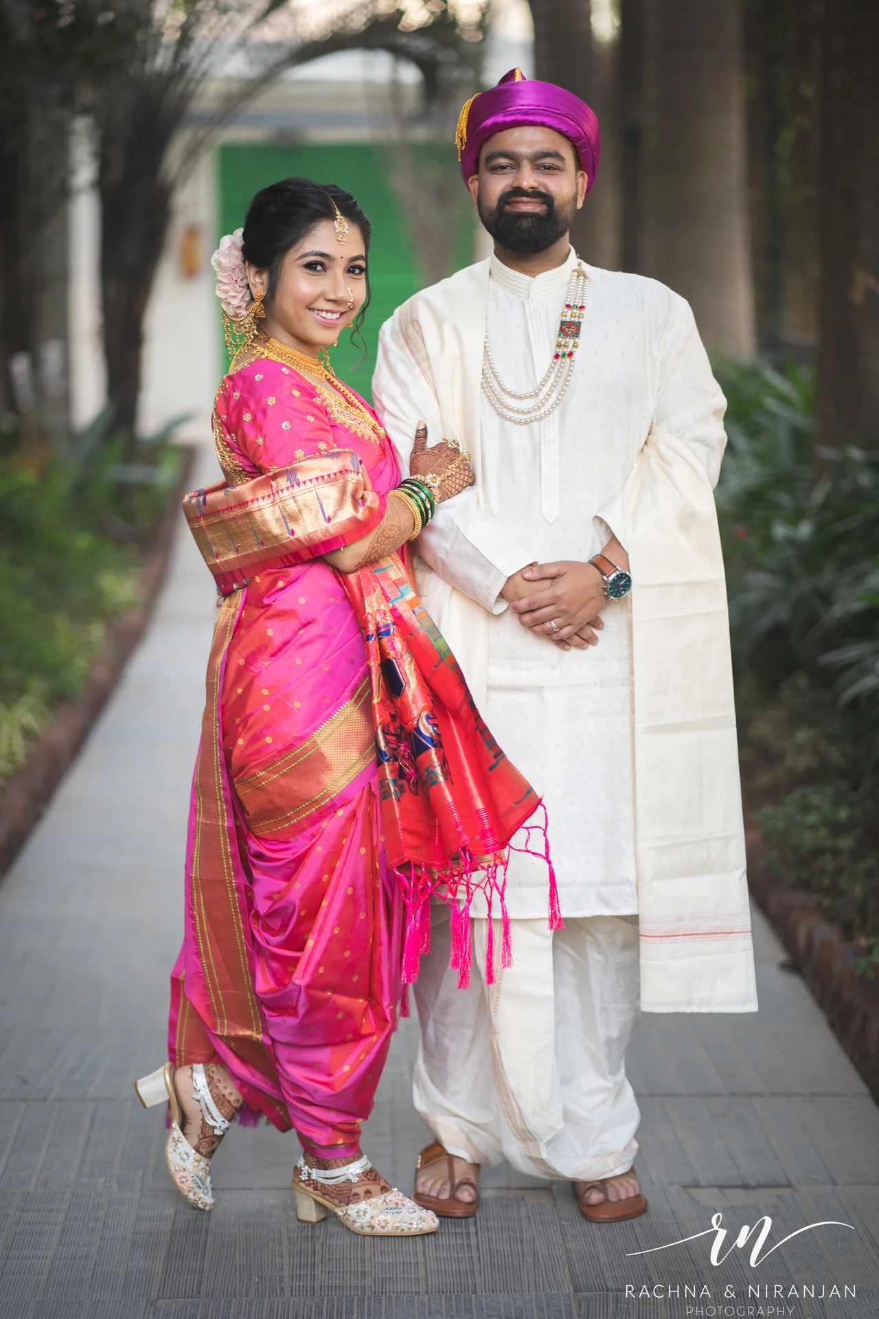 Sneha & Rahul sharing a quiet moment during their couple shoot – elegant candid photography at Mayfield Estate, Pune.