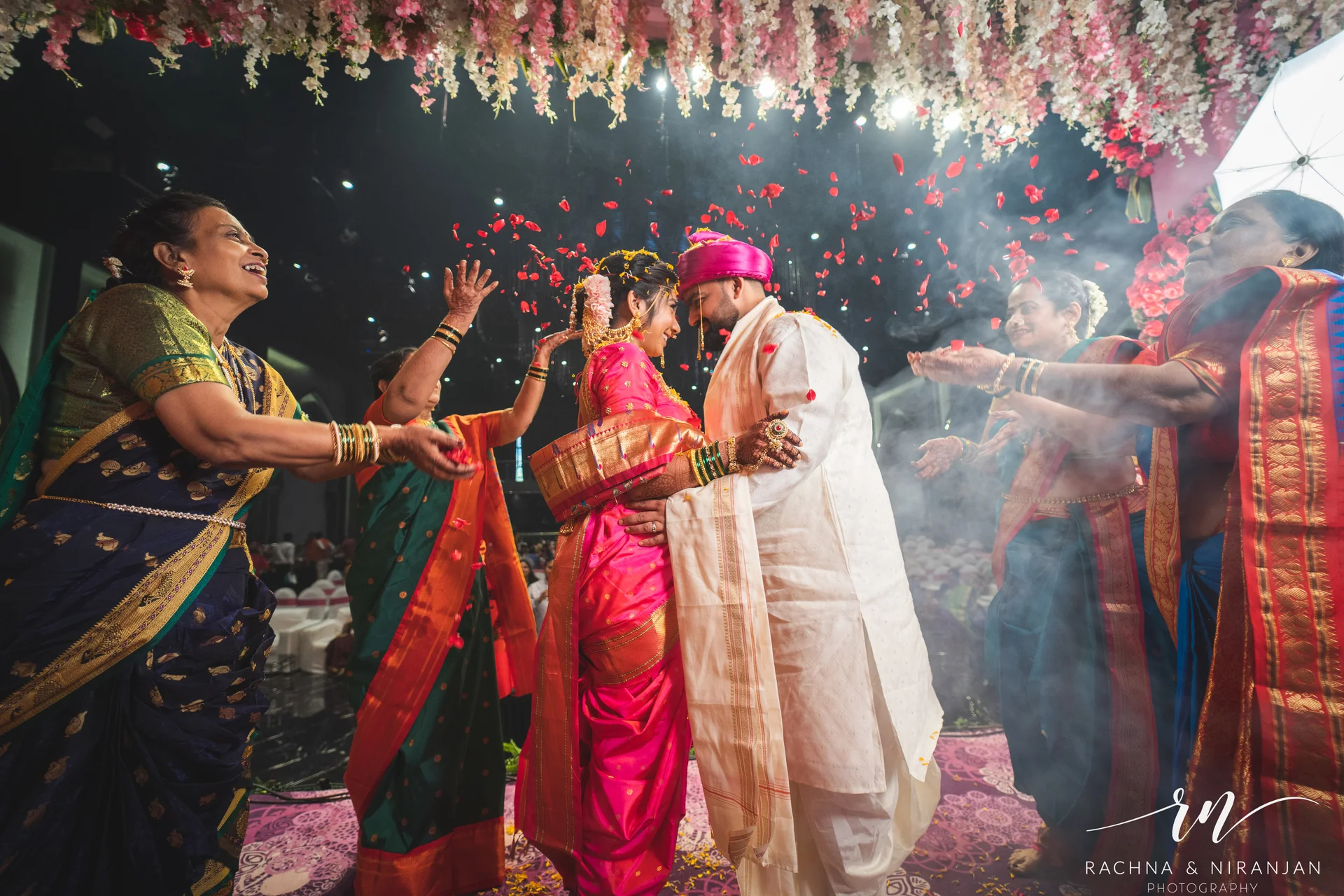 Authentic candid shot of Sneha laughing during her Gujarati wedding – a real moment captured at Mayfield Estate, Pune
