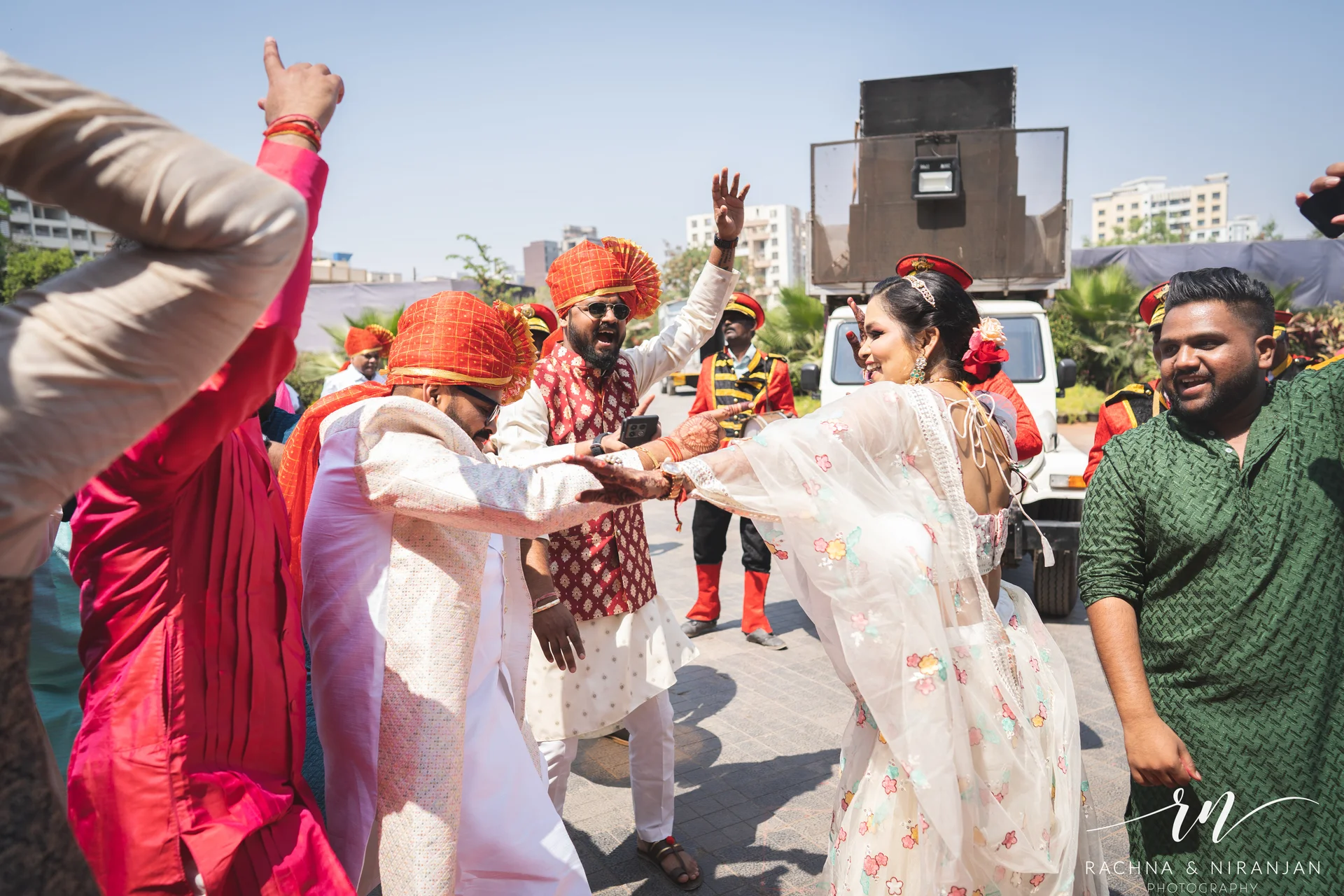 High-energy dance performance by friends and family during Sneha & Rahul’s Gujarati wedding celebrations at Mayfield Estate