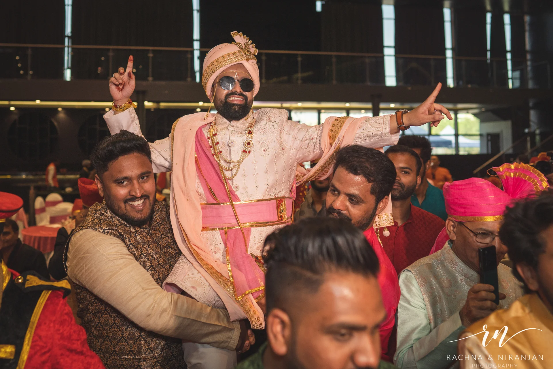 Authentic candid shot of Sneha laughing during her Gujarati wedding – a real moment captured at Mayfield Estate, Pune
