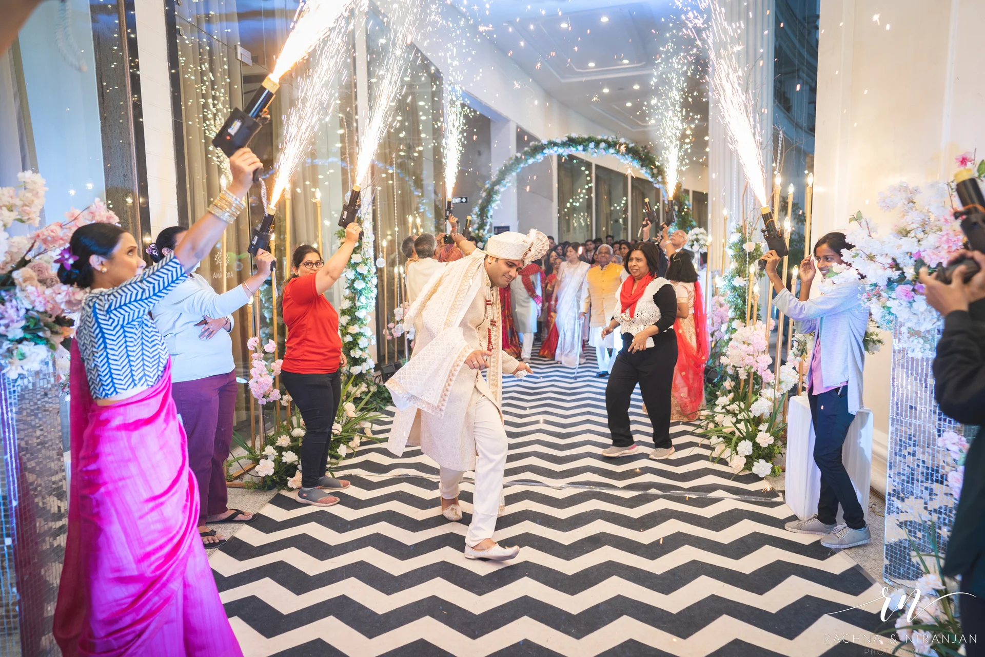 andid photo of groom Rohit arriving in style at Amanora The Fern - Top Wedding Photographers in Pune