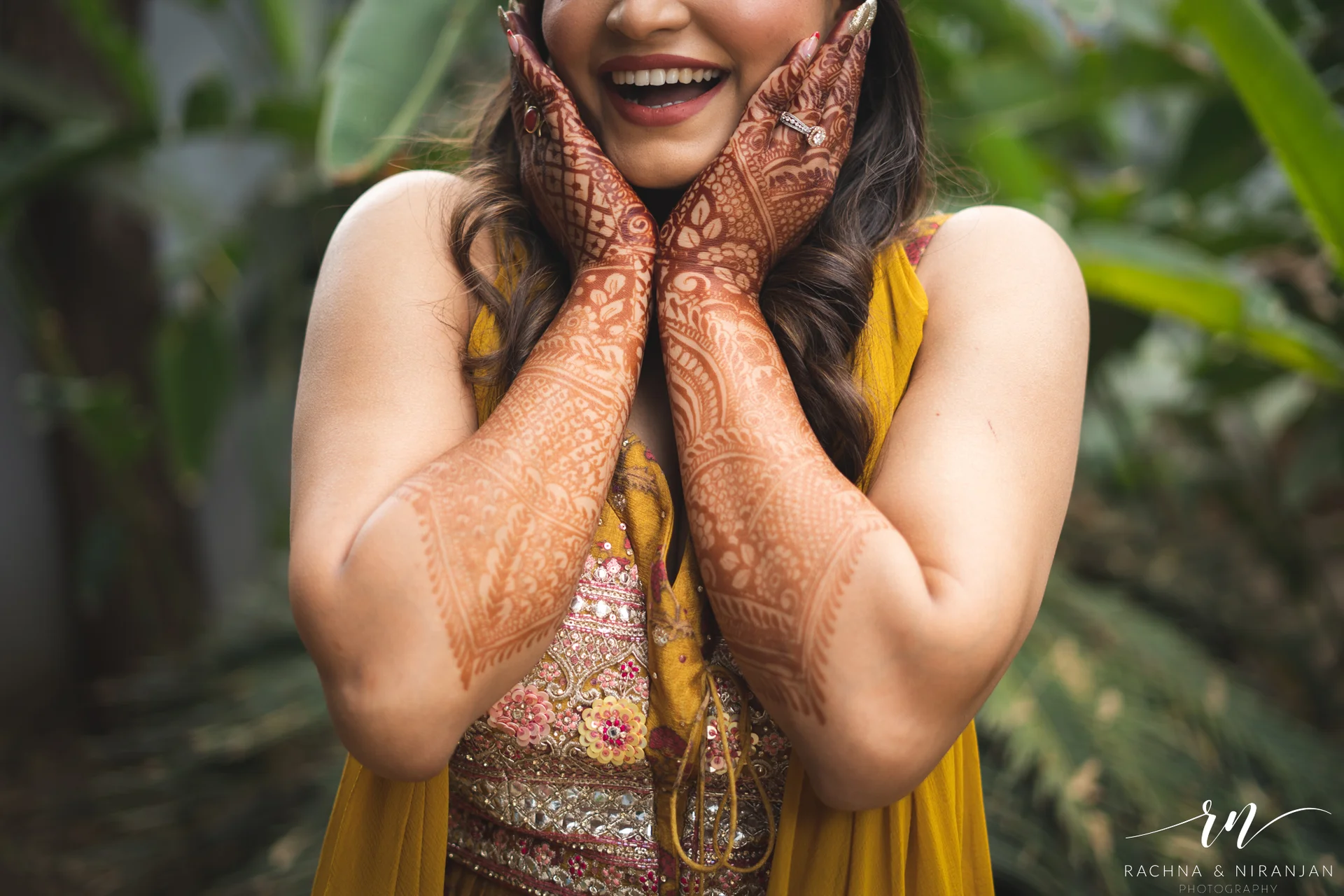 Candid shot of bride Pratiksha smiling during her Haldi ceremony at Amanora The Fern, Pune – captured by the best wedding photographers in Pune