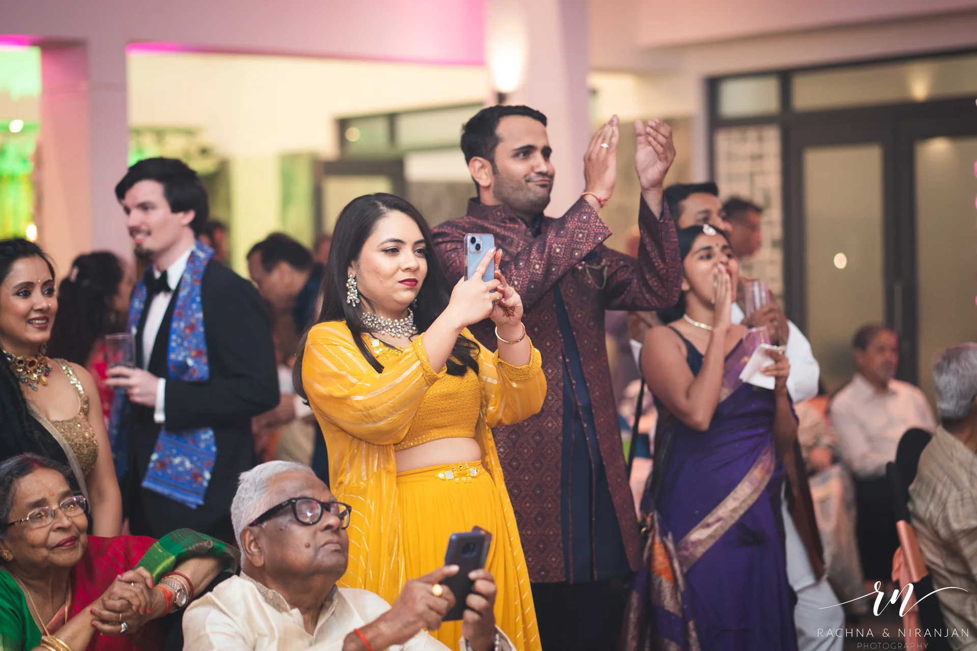 Guests enjoying the music and dance floor at Pratiksha & Rohit’s lively Sangeet function – authentic moments at Amanora The Fern