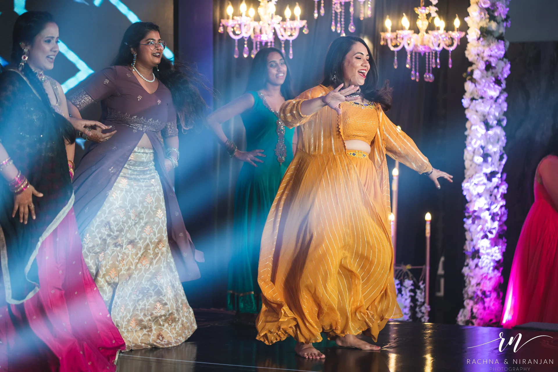 Friends and family dancing together during Sangeet – vibrant moments from a Bihari wedding at Amanora The Fern, Pune