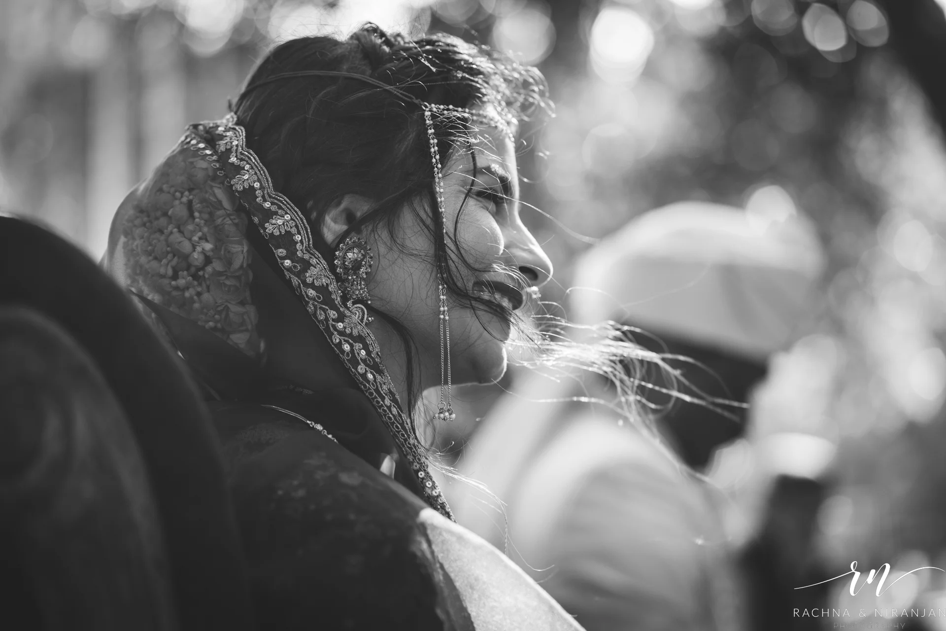 Black and White Candid Moment of Priyanka & Abhi During Their Maharashtrian Wedding at Taj Gateway, Nashik | Captured by Candid Photographer in Pune