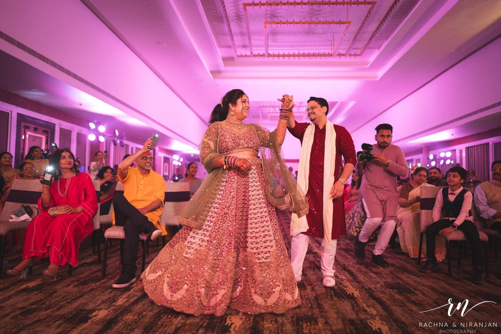 Bride and Groom Dancing Together at Sangeet Night | Destination Wedding Photographer in Chennai
