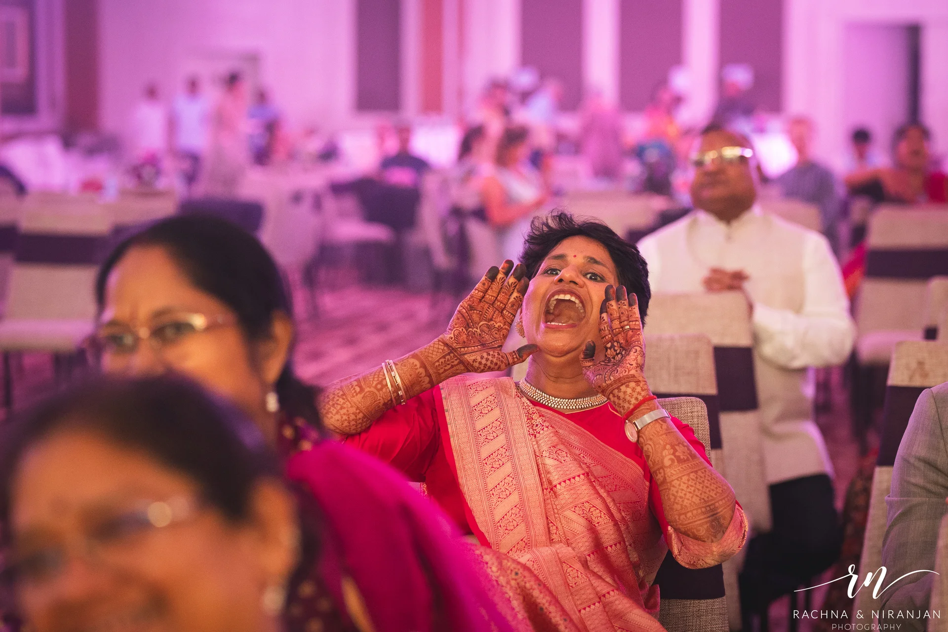 Guests Enjoying the Sangeet Evening at Srishti & Shiva’s UP–Tamil Wedding | Wedding Photographers