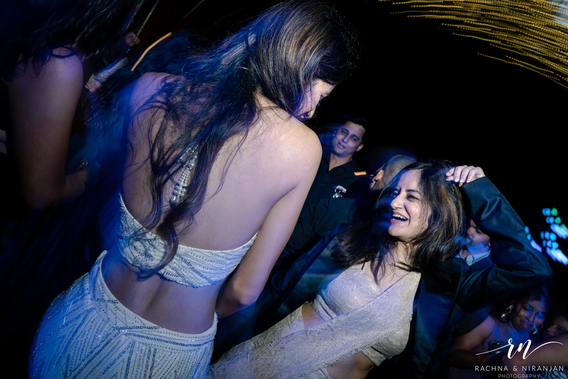 Friends and family dancing at destination wedding