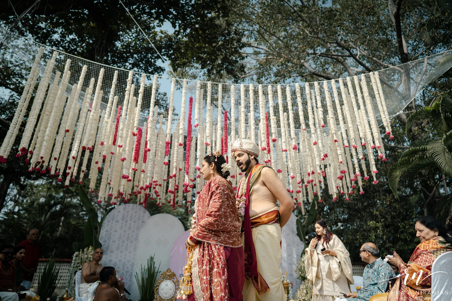 Bride and groom performing Tamil wedding rituals during Kalyanam ceremony