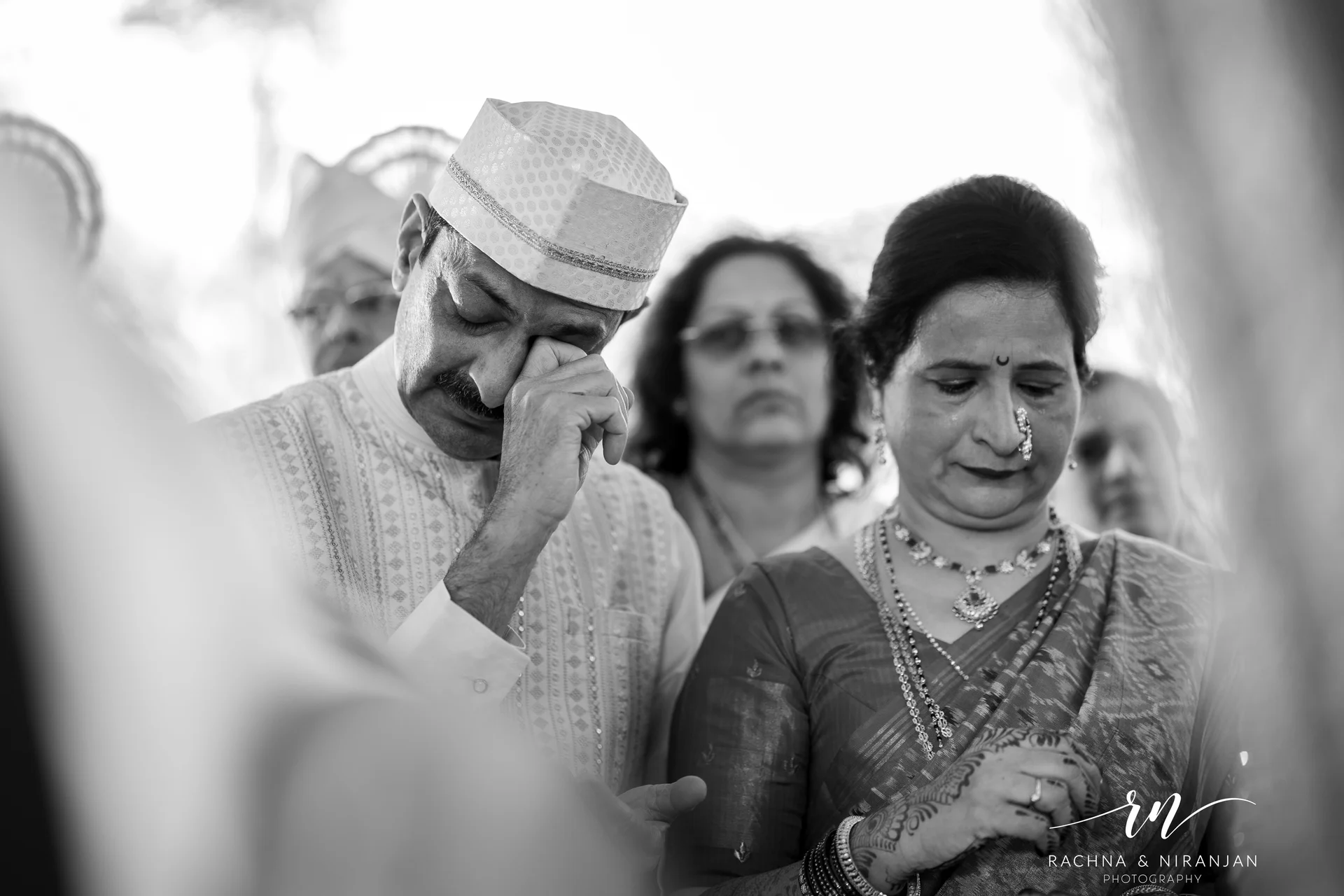 Emotional candid wedding moment captured at Sub Area Mess Pune by Rachna Niranjan Photography