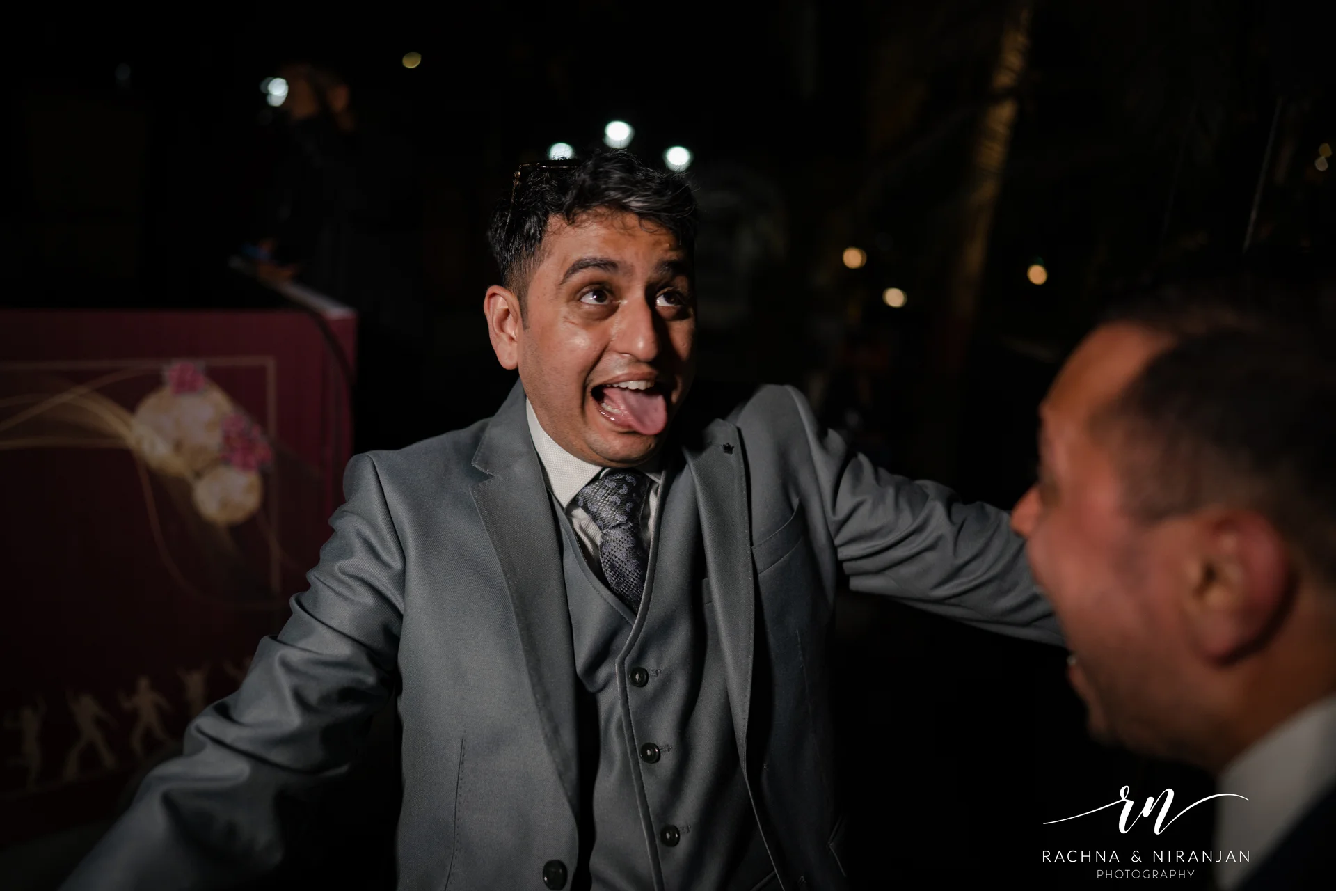Groom candid moment during Maharashtrian wedding celebration by Rachna Niranjan Photography