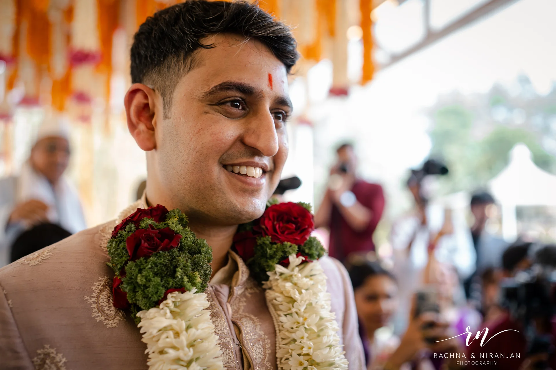 Maharashtrian bride smiling during wedding rituals in Pune