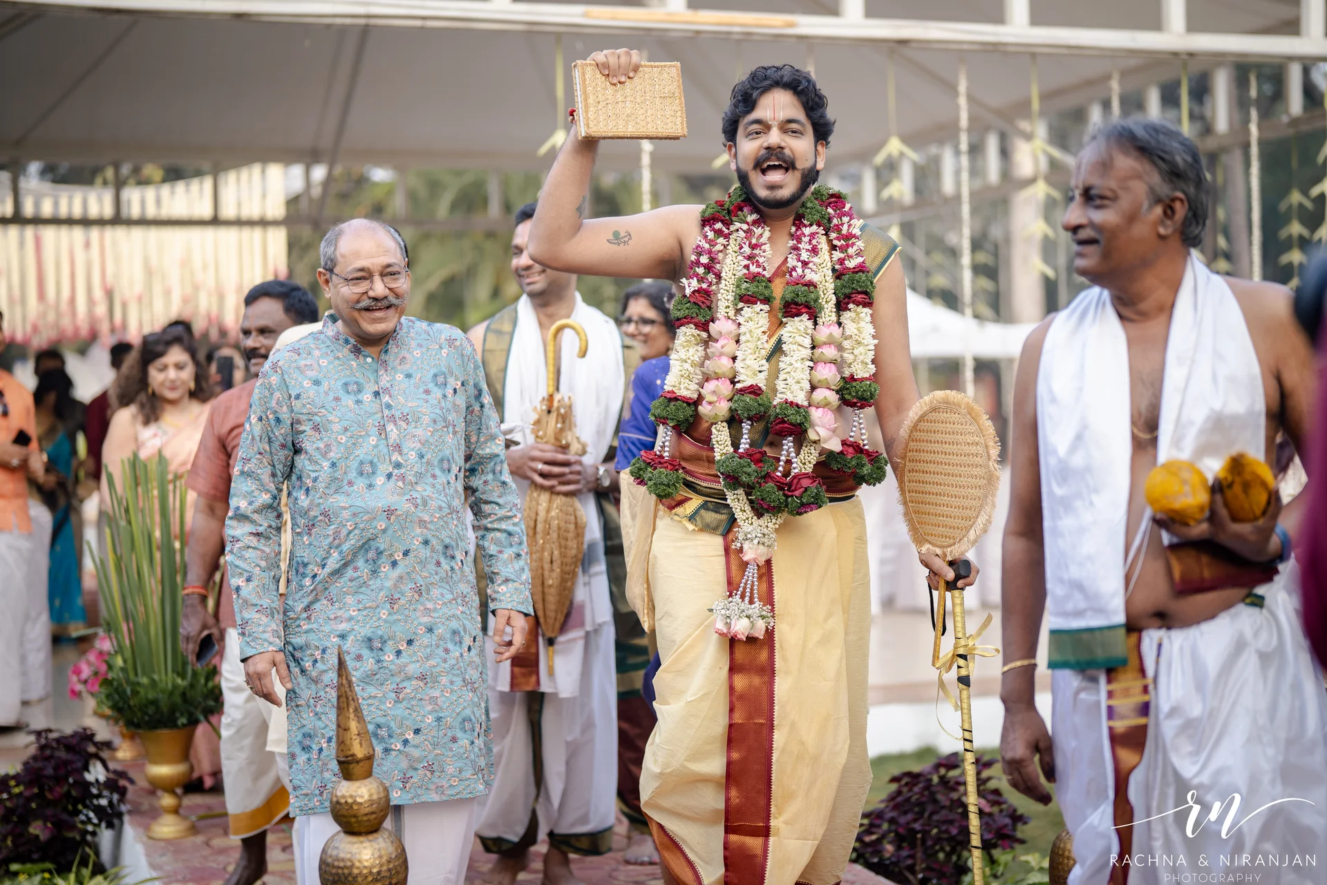 Punjabi groom and Tamil bride sharing a candid moment at Pune wedding celebration