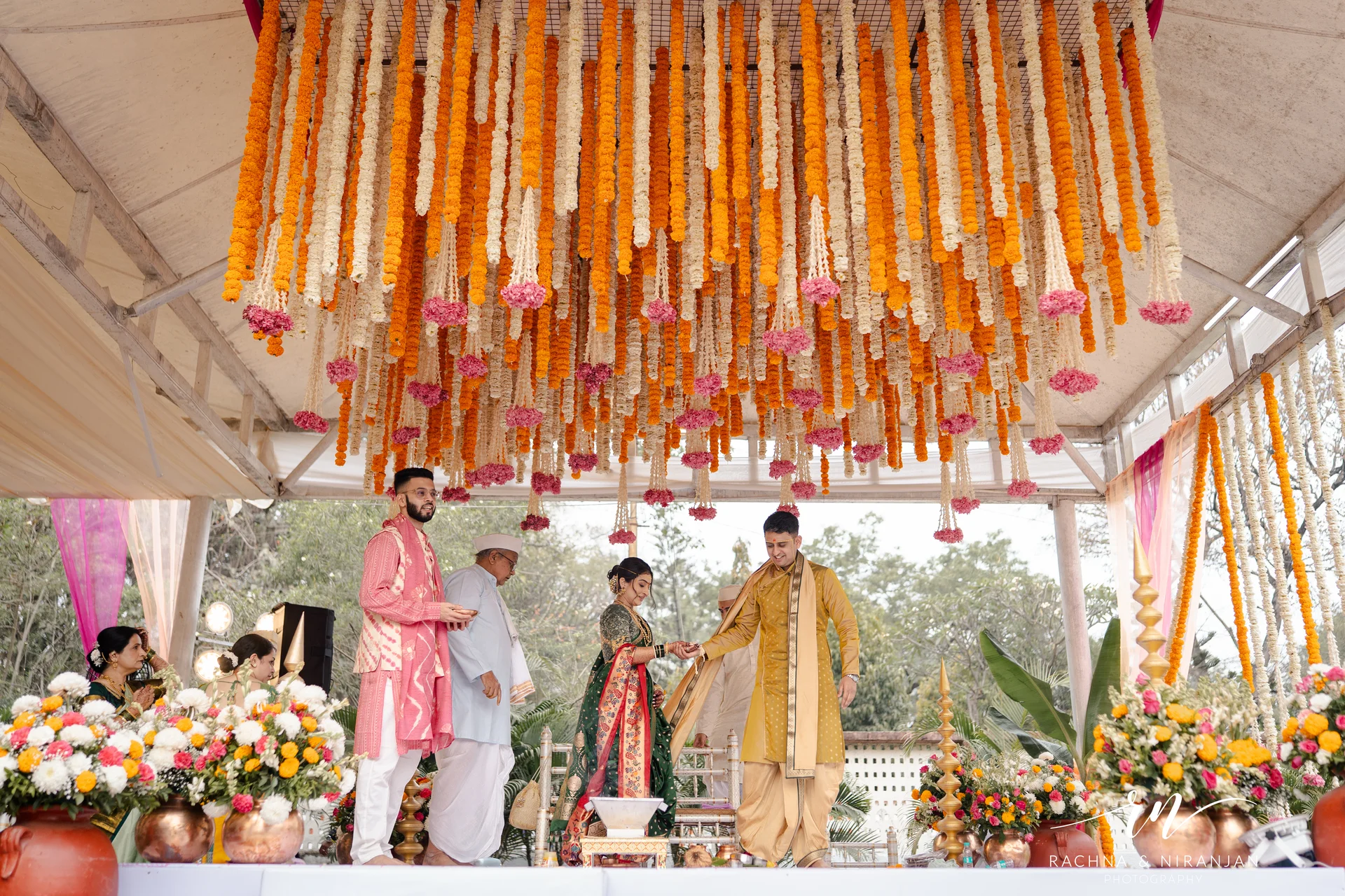 Wedding ceremony under floral mandap at Sub Area Mess Pune