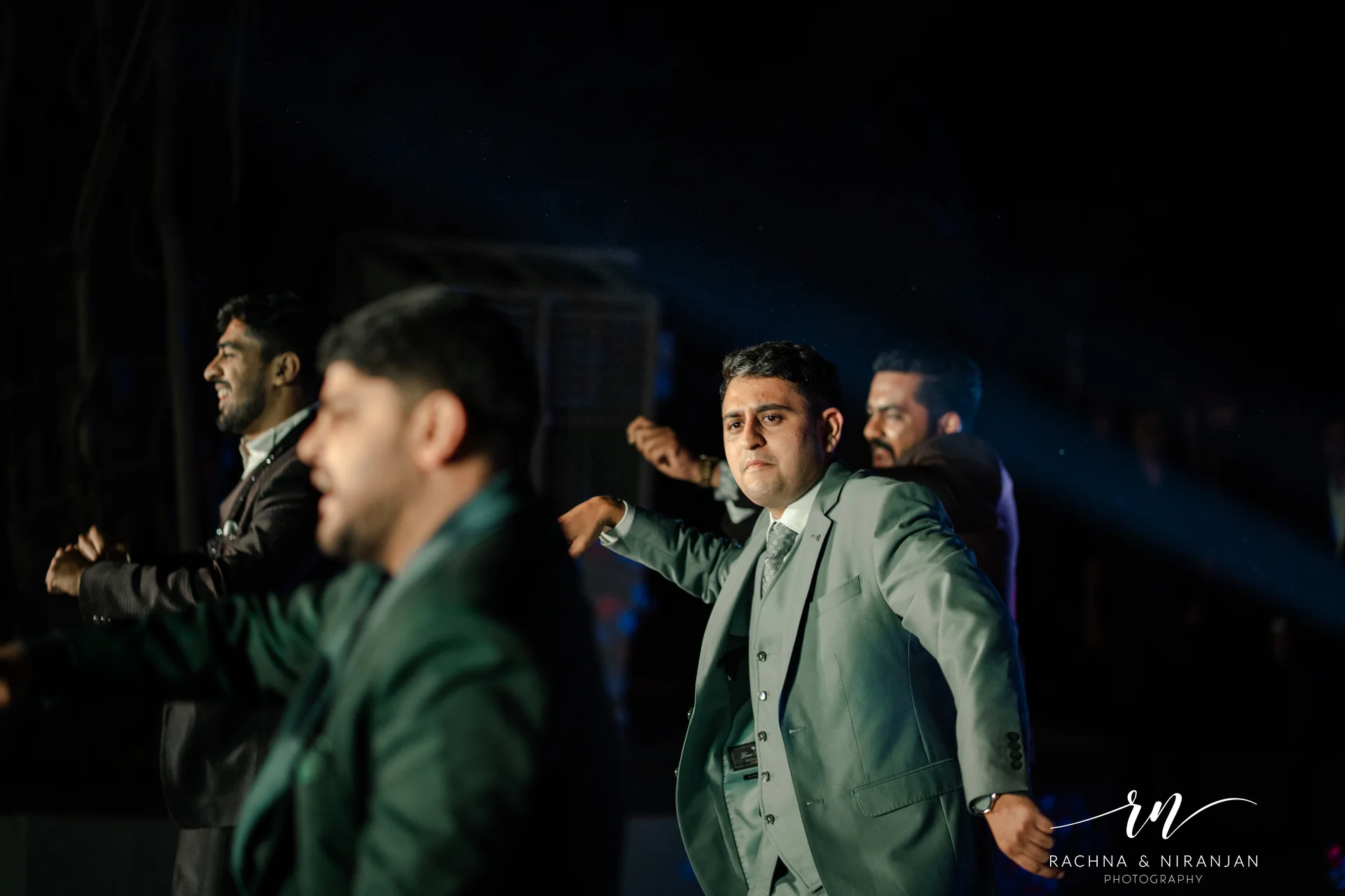 Wedding reception party dance captured by Rachna Niranjan Photography