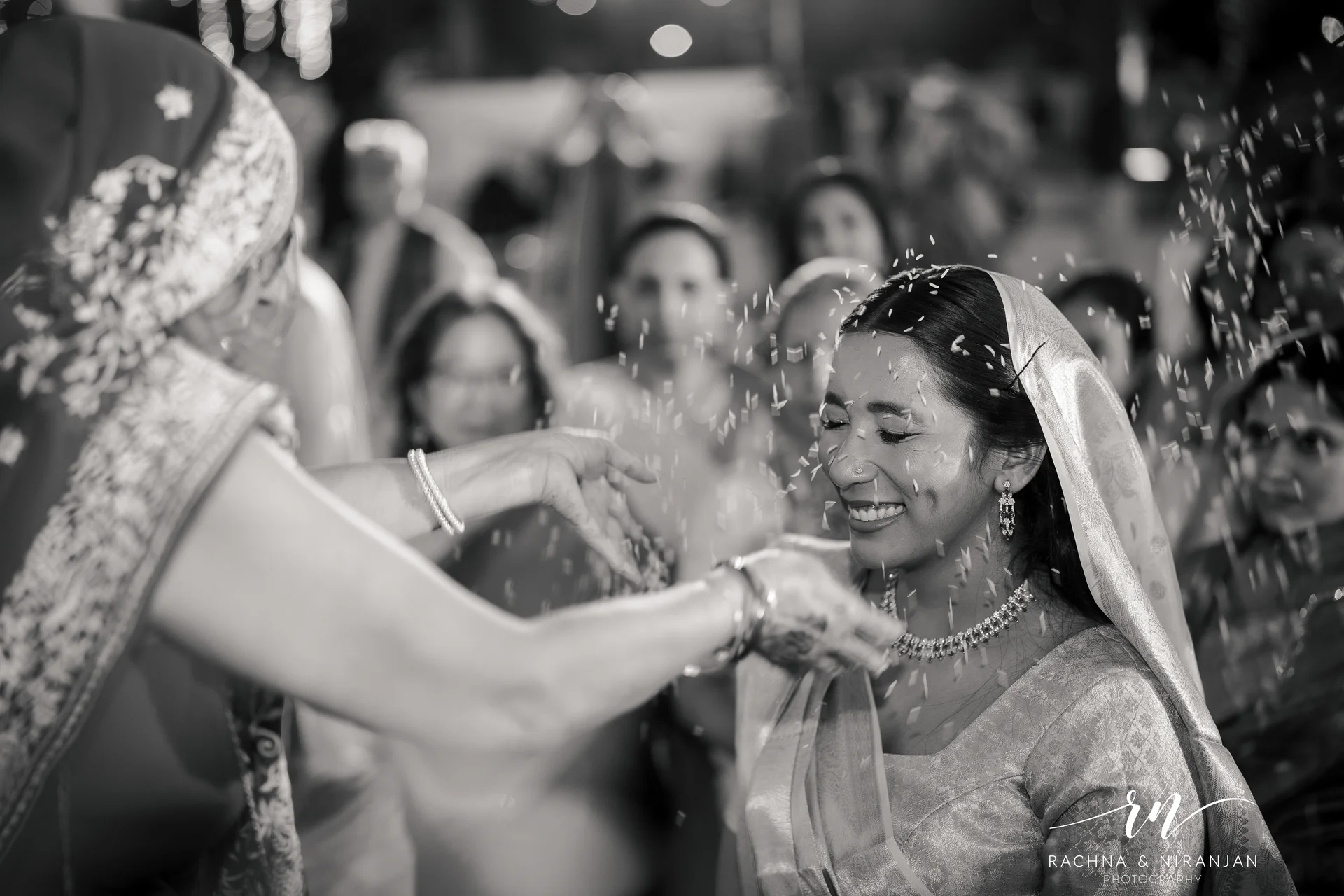 Black and white bride dancing during wedding celebration - Marathi wedding photographer Pune