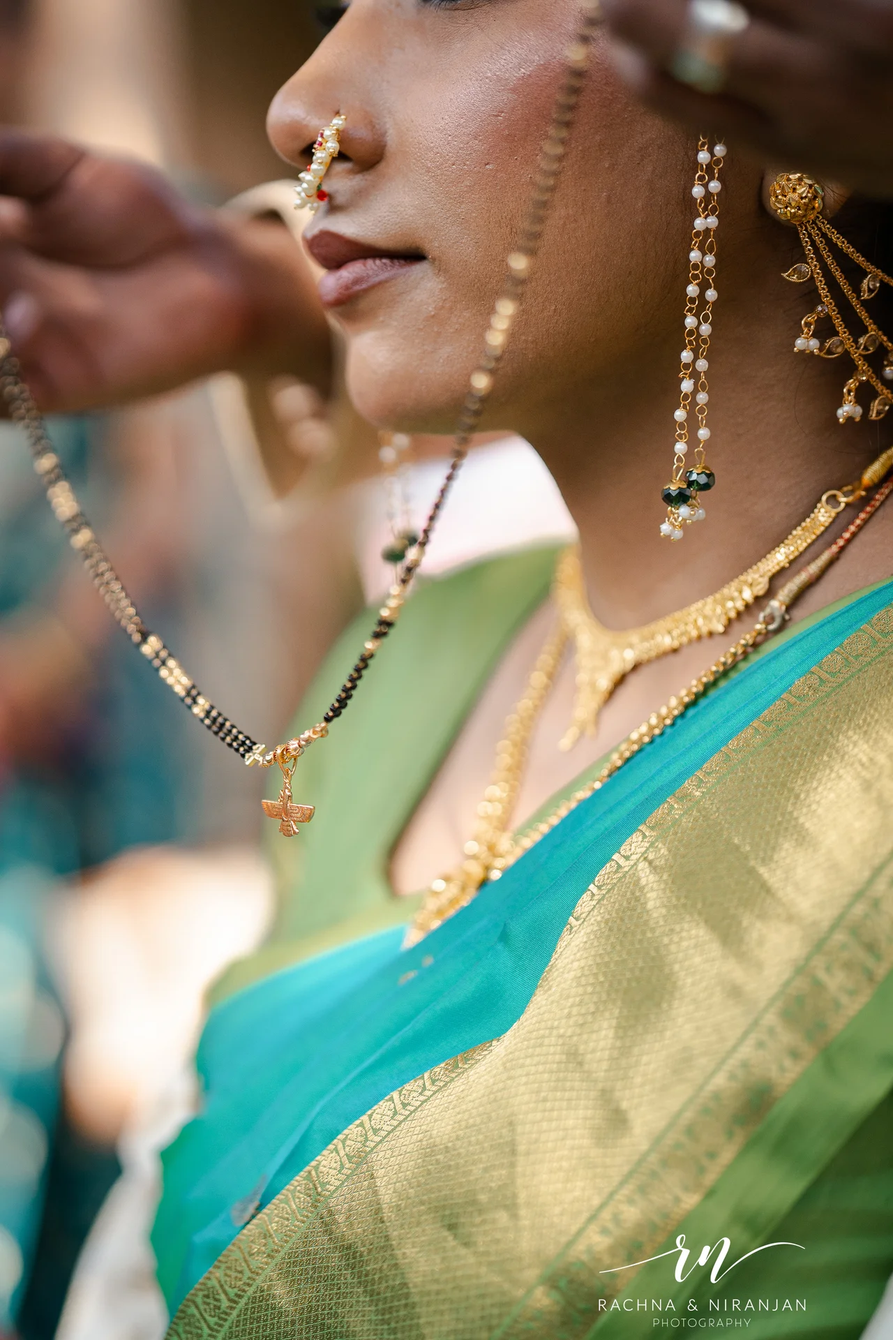Bride in teal saree laughing candidly — Marathi wedding photography Pune