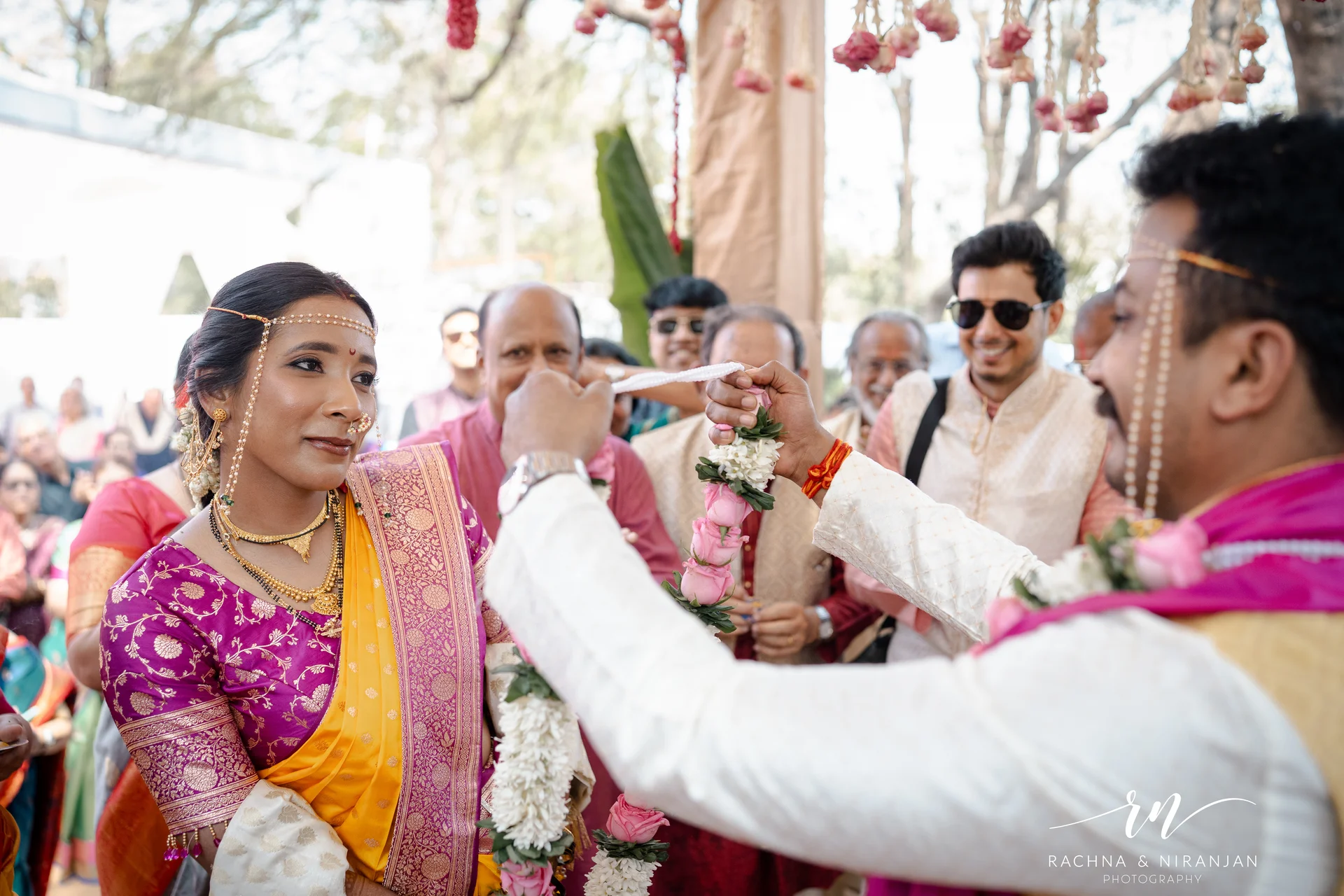 Couple sharing intimate moment during Marathi wedding ceremony — candid wedding photography Pune