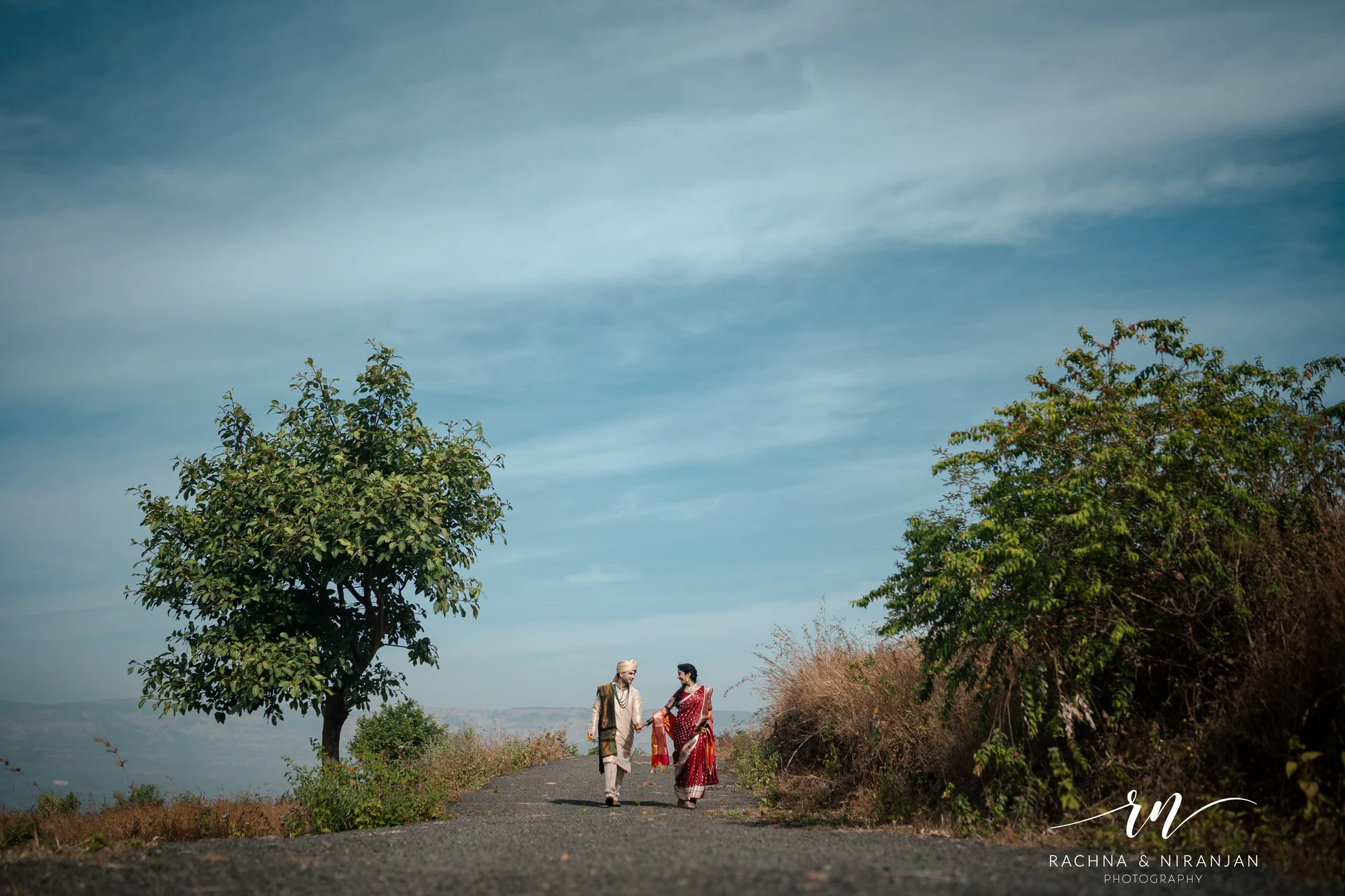 Bride and groom at scenic farmhouse wedding