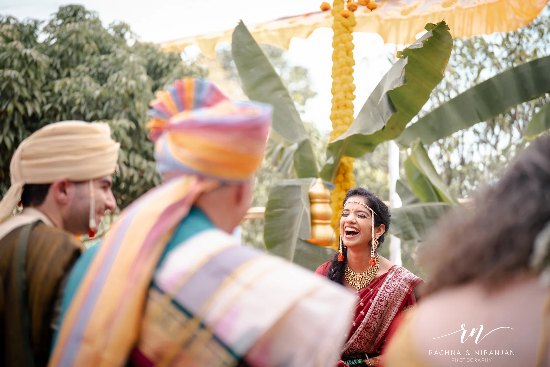 Candid wedding moment at farmhouse venue