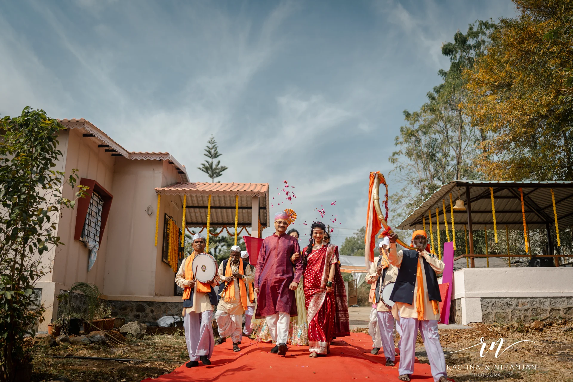 Wedding procession at farmhouse venue in Panshet